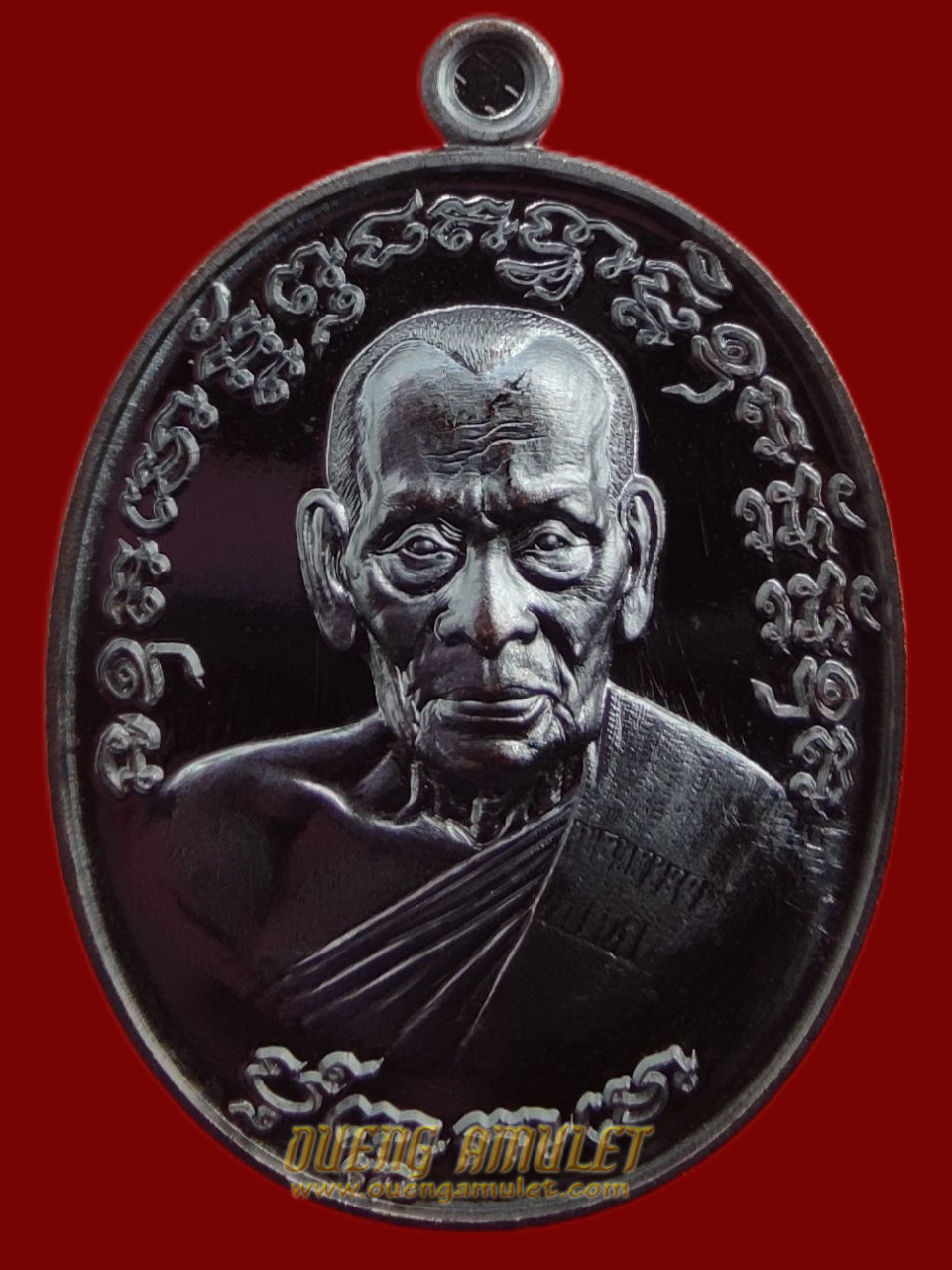 เหรียญเจริญพร 2 หลวงพ่อพัฒน์ ปุญญกาโม พิมพ์ครึ่งองค์ เนื้อทองแดง พรายดำ