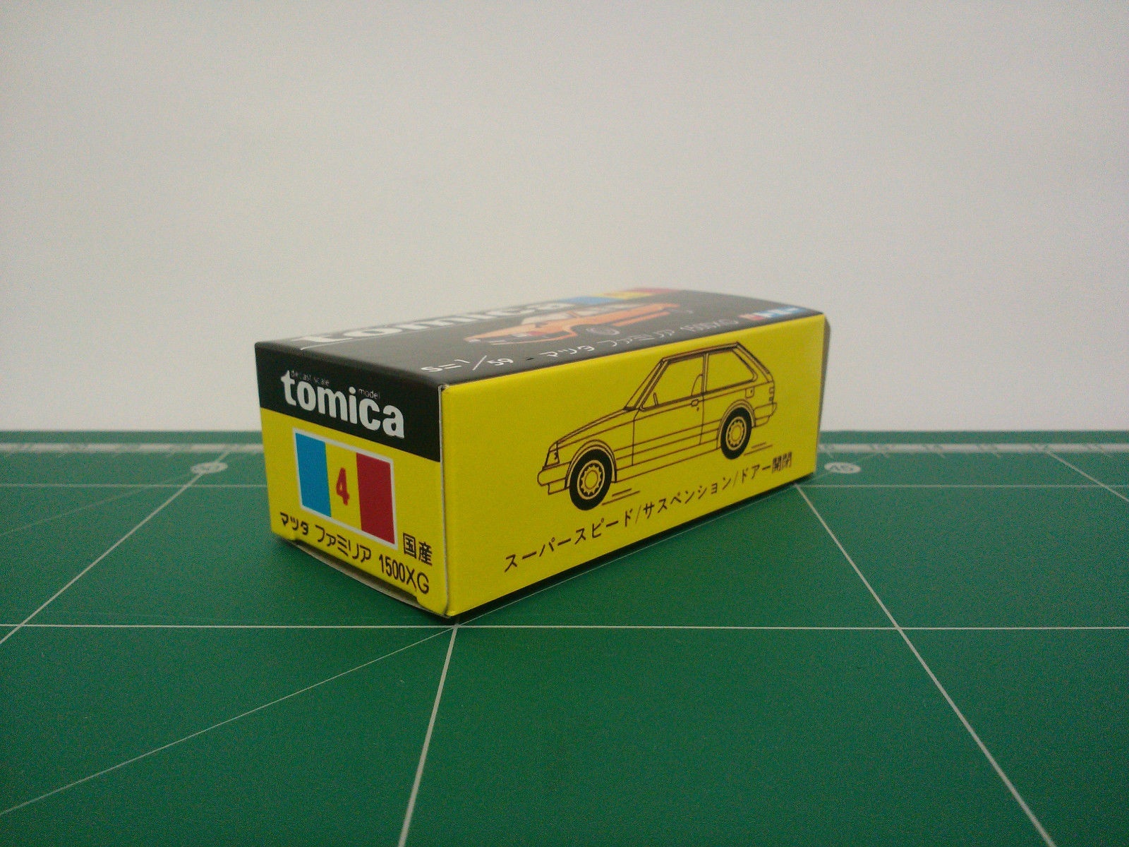 กล่องพิมพ์ Reproduction Box สำหรับ Tomica Black Box No.4 Mazda Familia 1500XG (กล่องเปล่า, ไม่มีรถ)