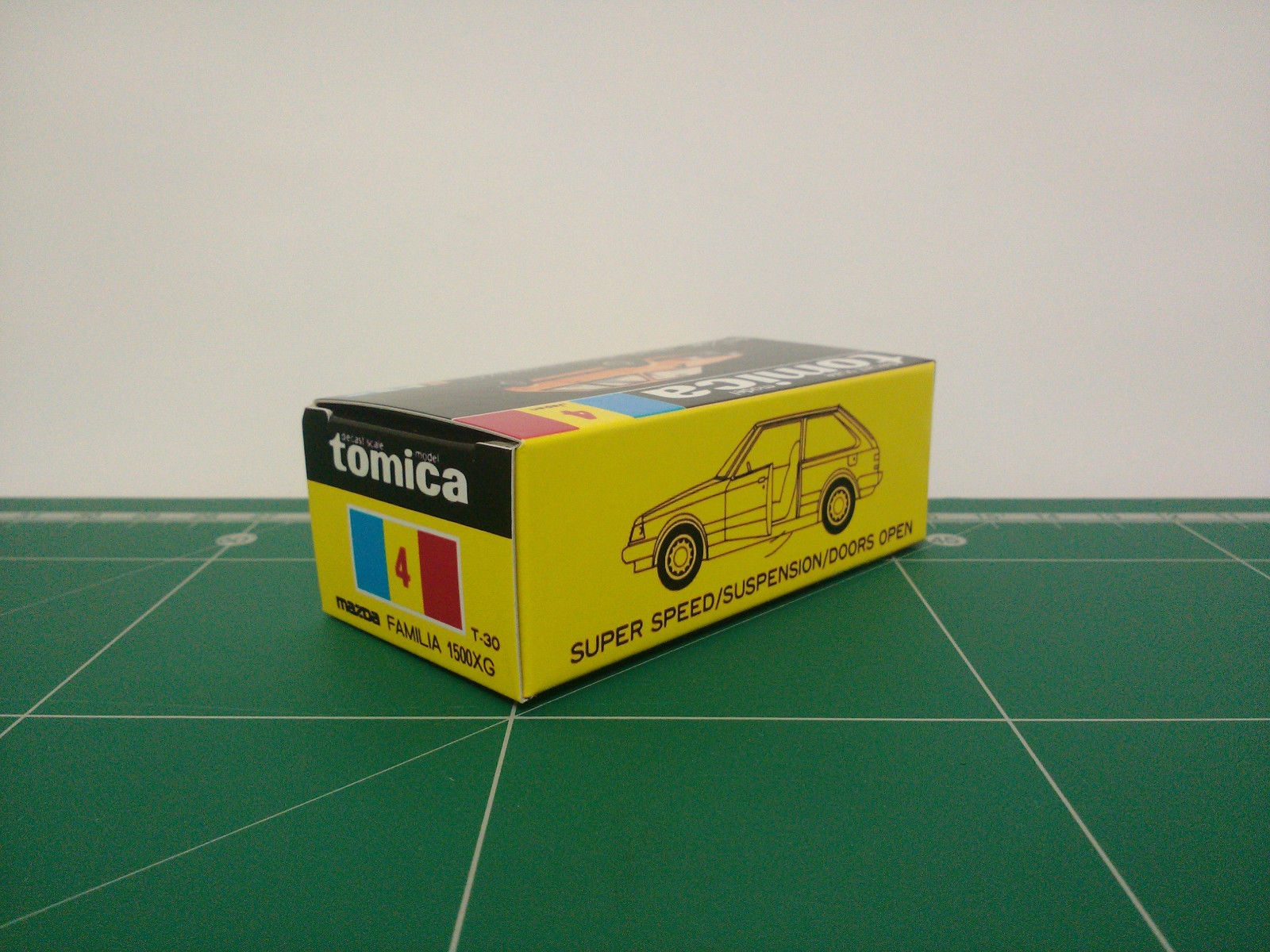 กล่องพิมพ์ Reproduction Box สำหรับ Tomica Black Box No.4 Mazda Familia 1500XG (กล่องเปล่า, ไม่มีรถ)