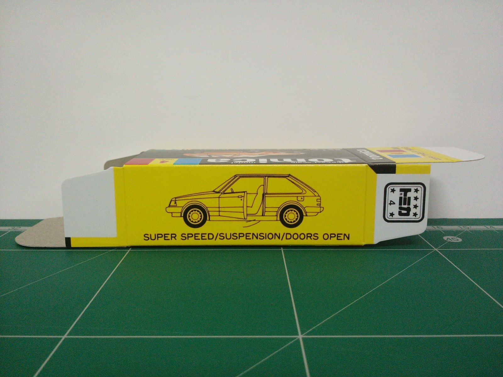 กล่องพิมพ์ Reproduction Box สำหรับ Tomica Black Box No.4 Mazda Familia 1500XG (กล่องเปล่า, ไม่มีรถ)