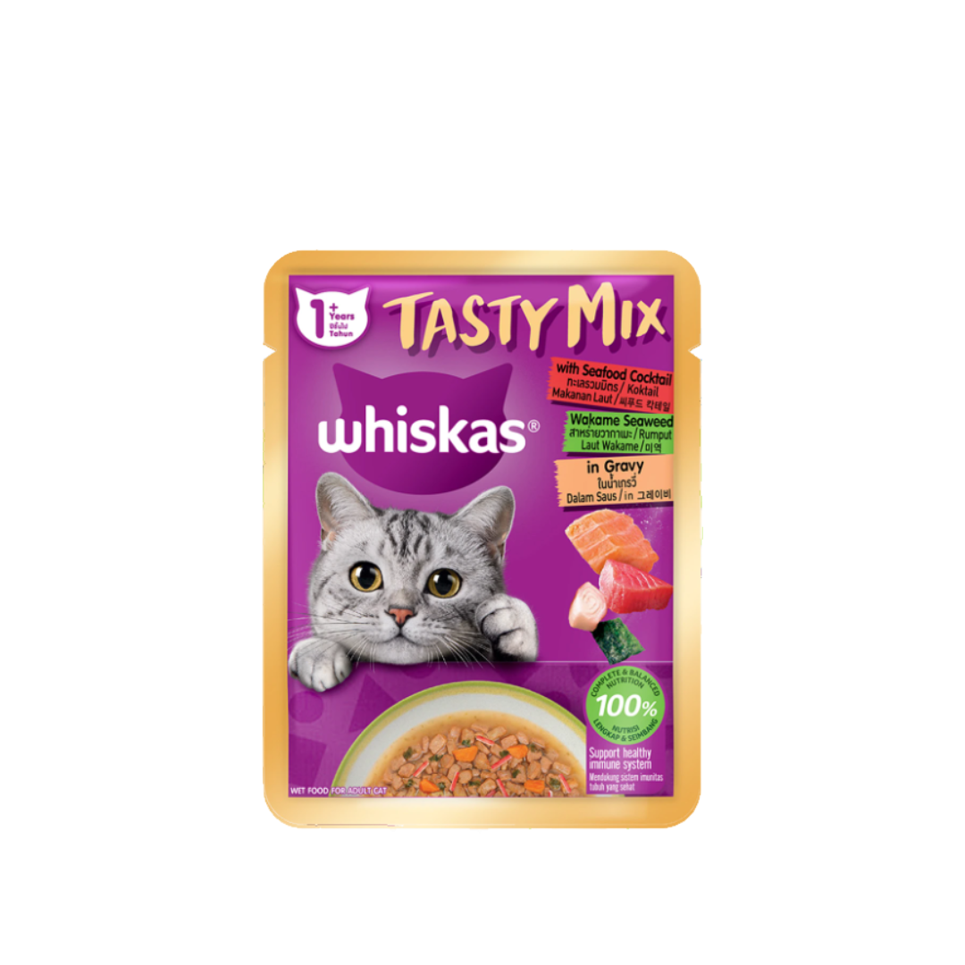 W/K Tasty Mix T2 ทะเลรวมมิตร+สาหร่ายวากาเมะ ในน้ำเกรวี่ 70g. (ชมพูเข้ม)