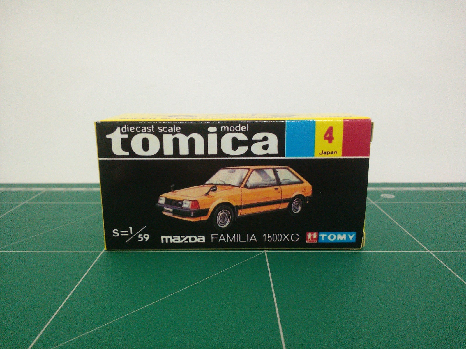 กล่องพิมพ์ Reproduction Box สำหรับ Tomica Black Box No.4 Mazda Familia 1500XG (กล่องเปล่า, ไม่มีรถ)