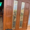 ประตูไม้สักกระจกนิรภัยบานคู่