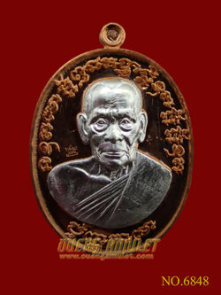 เหรียญเจริญพร 2 หลวงพ่อพัฒน์ ปุญญกาโม พิมพ์ครึ่งองค์ เนื้อทองแดงหน้ากากเงิน